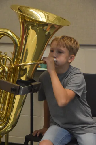 Lenihan students experiment with band, orchestra instruments during tryouts